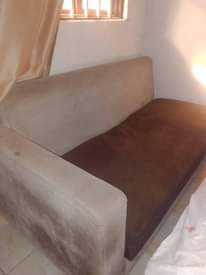A picture of 3 seaters sofa and CAMON 11