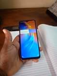 A picture of 230k spark 5 air 32gb 2gb ram 500mah
