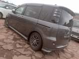 A picture of 18 toyota sienta model 2008 9 price tag.. 26.5m ugx