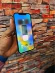 A picture of iPhone 12promax with Face ID 128gib bh