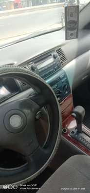 A picture of Christmas Deal Sharp Red Toyota Corolla 2005 First Body Engine