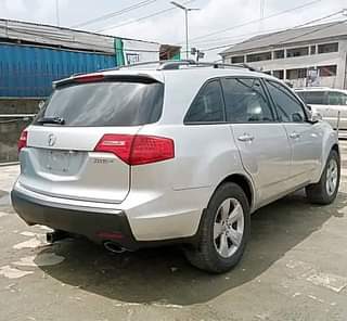 A picture of 4 5m last settle 100k Sharp Acura MDX 2008 partly