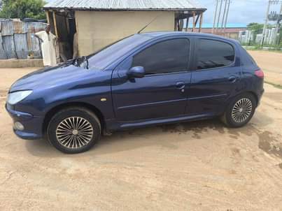 A picture of 206 MANUAL IN GOOD CONDITION BUY AND DRIVE AT JUST