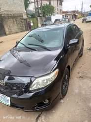 A picture of Toyota corolla nigeria used 2009 molde ac everything is working