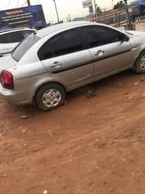 A picture of Hyundai accent complete first body engine gear perfect. Ac not