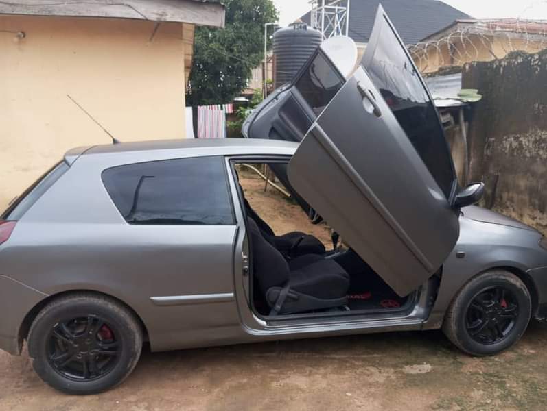 A picture of Toyota Corolla Obama pimped sport with flying doors located in
