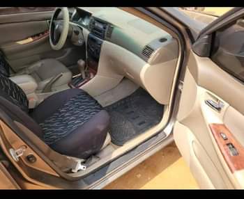 A picture of Toyota Corolla 04 Engine and Gear ok Ac is chilling