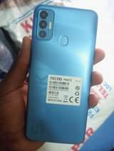 A picture of Its tecno spark 7 good as new still clean 32gb
