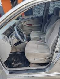 A picture of 2007 MODEL SILVER TOYOTA COROLLA Engine Gear super AC needs
