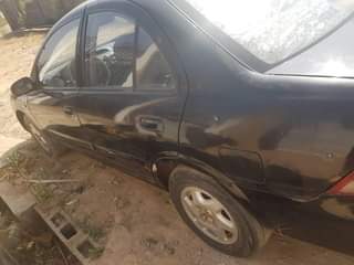 A picture of Nissan sunny 2010 do car is good engine and gear