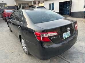 A picture of Dealer Delight Registered TOYOTA CAMRY 2012 Model painted remote entry
