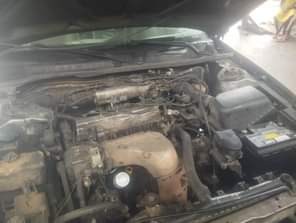A picture of TINY CAMRY LIGHT ENGINE GEAR AC NEEDS GAS BODY OKAY