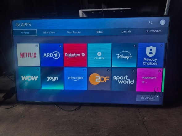 A picture of 55 INCHES SAMSUNG SMART 4K UHD TV WITH A TINY