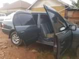 A picture of TOYOTA kikumi Corolla gray UAM Call 0703676426 buy drive