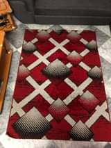 A picture of Vinauzwa vyote Sofa L shape carpet na showcase mbao Vyote