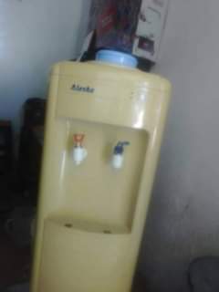 A picture of Water dispenser for sale I need 130000 shillings if you