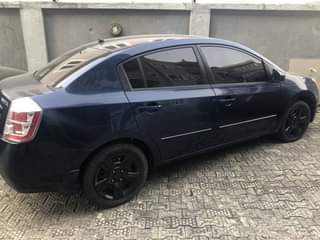 A picture of URGENT BUYER NEEDED Nissan Sentra 2009 model Factory AC clean