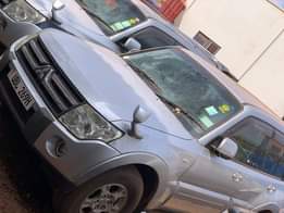 A picture of Pajero bitama petrol in excellent condition 2010 Two cars each