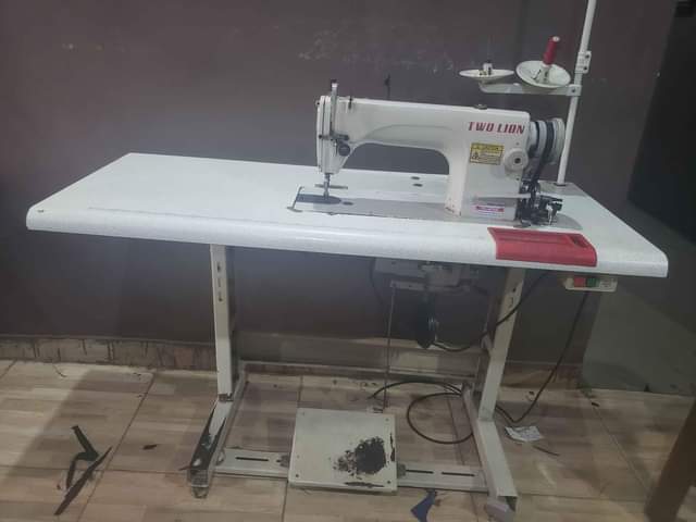 A picture of Two lion sewing machine