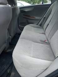 A picture of 2010 model of Toyota Corolla engine body ac very okay