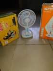 A picture of Gotv decoder with accessories and Rechargeable fan