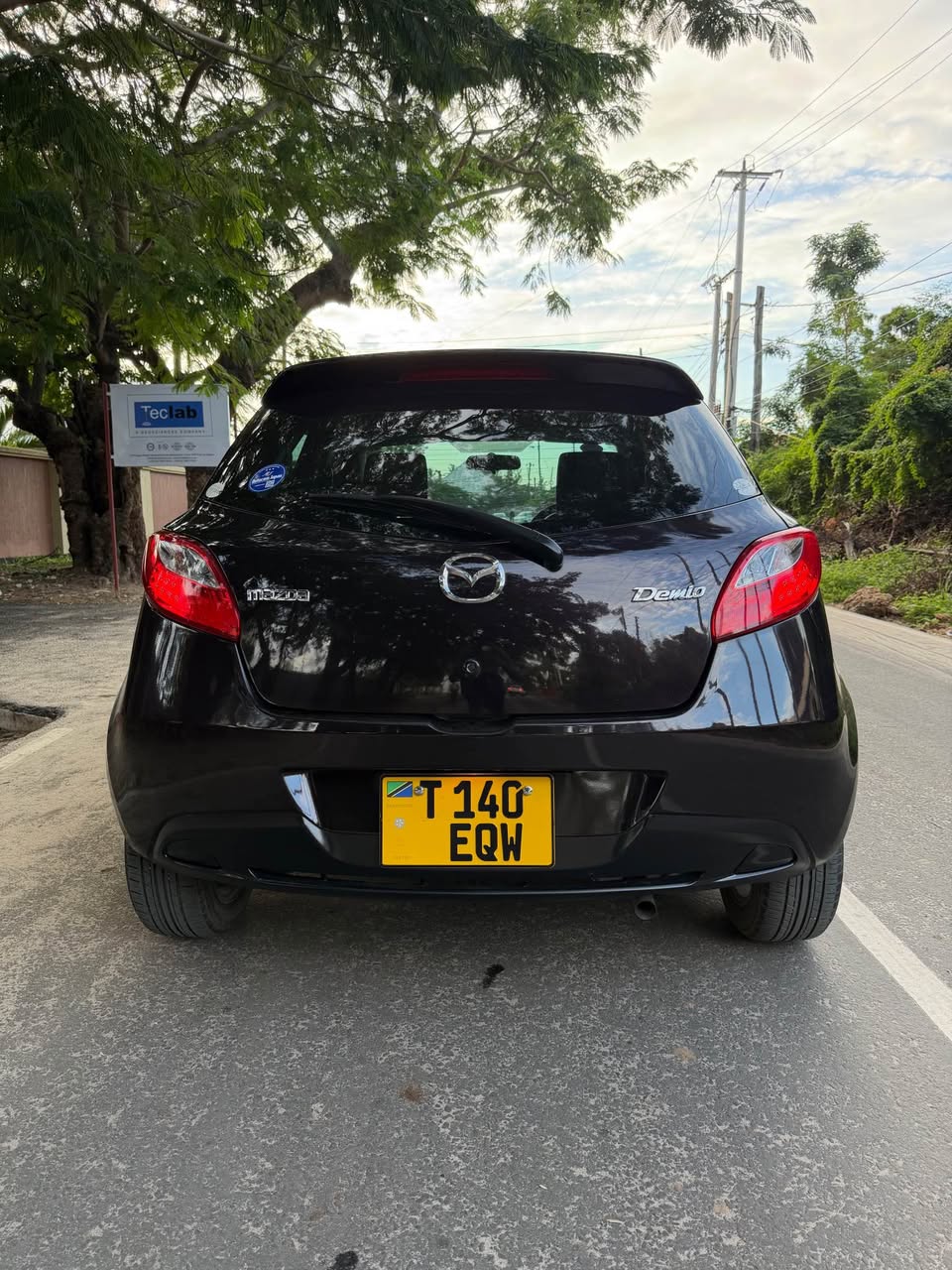 A picture of MAZDA DEMIO EQW PRICE 14 8M 0765242424 Call WhatsApp INSTAGRAM