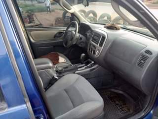 A picture of Ford escape for sale Everything is working perfectly Location is