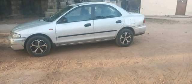 A picture of Mazda 323 Protege FIRSTBODY Dm or Call 09068030011 Beautiful in