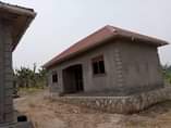 A picture of 3 houses for sale at Bombo Kalure near St Janan