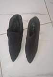 A picture of shoes for sale R100 each pair