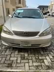 A picture of Toyota Camry 2004 First body but some parts painted Uber