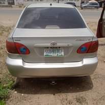 A picture of Corolla Engine and manual Gear working perfectly well Ac needs