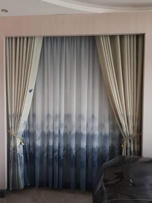 A picture of CURTAINS CARPETS