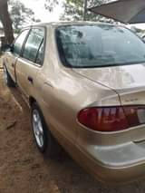 A picture of Extremely super sharp Toyota Corolla 2000 model with Untempered Engine
