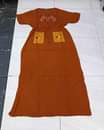 A picture of Dresse and kanzu