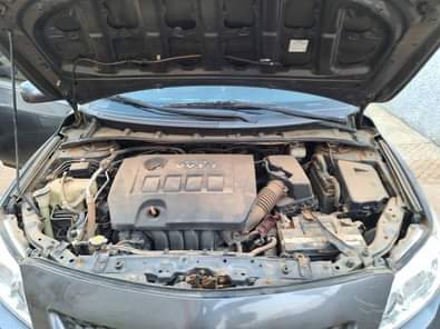 A picture of 2010 Corolla in Abuja Barely 6months used First body and