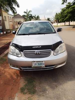 A picture of Another Sharp Distress Alert Clean 2005 Toyota Corolla with sound