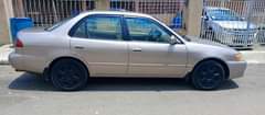 A picture of Standard Very Sharp Clean Toyota Corolla 2000 gray color Automatic