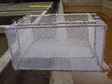 A picture of Fishcages fish tarpaulins siene nets scoopnets