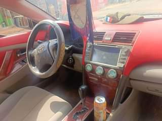 A picture of Toyota Camry 08 AC need gas only 