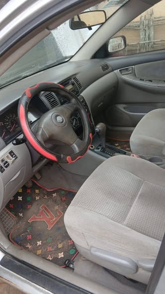 A picture of 06 Toyota Corolla Sound gear and working AC Smoking engine