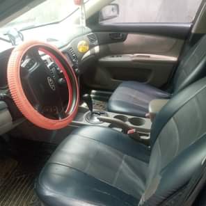 A picture of EZE NONI AUTOS 2009 Kia optima Very sharp Very 100