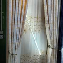 A picture of CURTAINS CARPETS