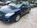 A picture of Toyota Corolla 2009 Engine is tapping at the top Ac