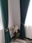 A picture of curtains and rods.