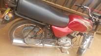 A picture of Bajaj for sale is good for bussines money needed urgently