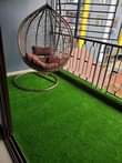 A picture of Artficial turf grass for offices.balconies.compoundz .etc