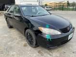 A picture of Toyota Camry 2006 4 plug Engine Gear Ac needs attention