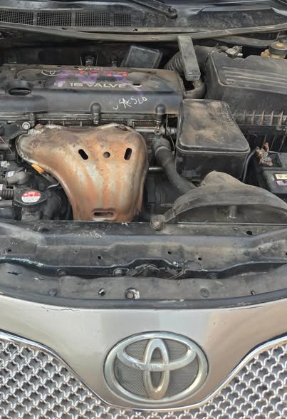 A picture of Sharp Distress Registered 2008 Toyota Camry XLE