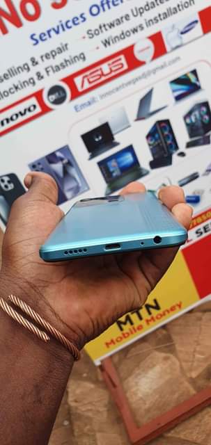 A picture of Tecno spark 8c with 64gb 4gb on sell 300k in